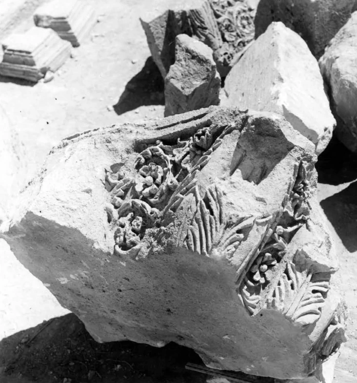 Archival photograph of fallen architectural fragments